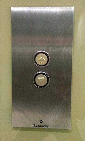 Botones ascensor hacia arriba y hacia abajo